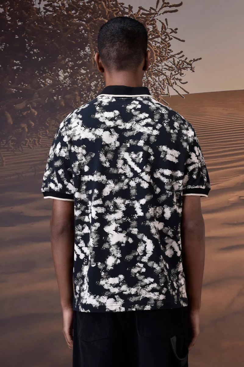 Genes Lecoanet Hemant  Black Abstract Print Polo for Men | Best Price UAE